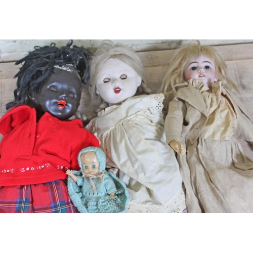 438 - A Simon Halbig bisque headed doll and three others.