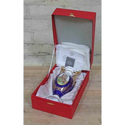 439 - A Spode Golden Wedding twin handled vase with box and certificate.