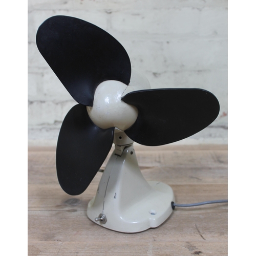 444 - A retro 'Kingway 12' desk fan with rubber blades, height 35cm.