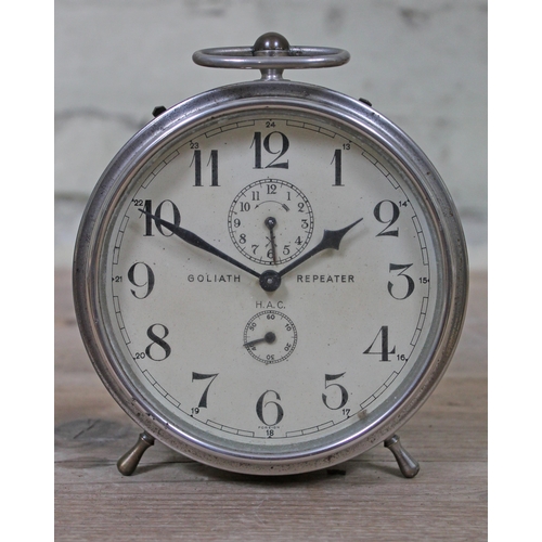 449 - A Goliath Repeater chrome clock, diam. 14cm.