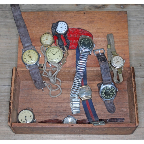 451 - A box containing ten various wristwatches.