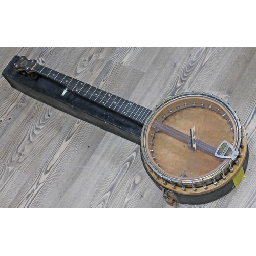 81 - A John Grey & Sons five string banjo serial no 17637 with case.