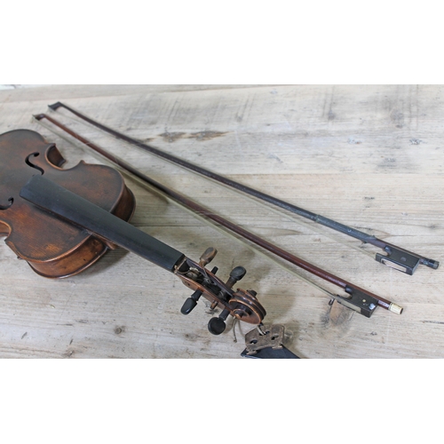 86 - A 19th Century violin and two bows.