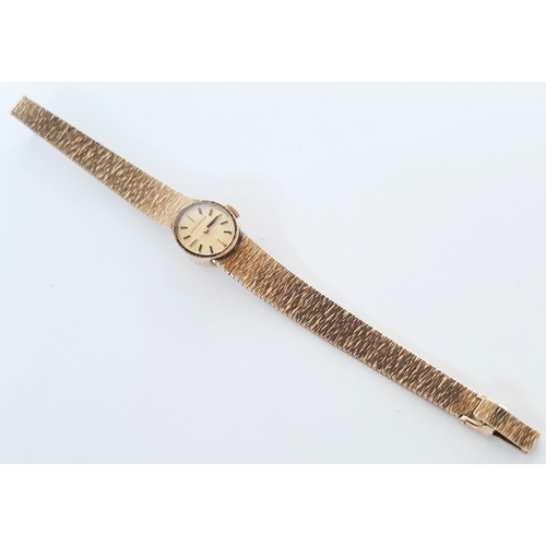 105 - A Longines hallmarked 9ct gold ladies wristwatch with hallmarked 9ct gold strap, length 180mm, gross... 