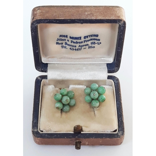 108 - A pair of gold and jade bead earrings, each with 7 small jade beads, diameter between 4-5 mm each, c... 