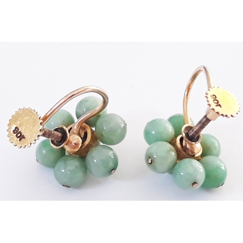 108 - A pair of gold and jade bead earrings, each with 7 small jade beads, diameter between 4-5 mm each, c... 