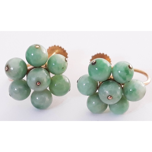 108 - A pair of gold and jade bead earrings, each with 7 small jade beads, diameter between 4-5 mm each, c... 