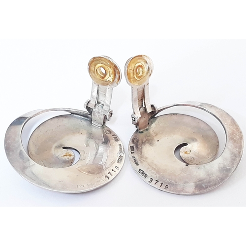 109 - A pair of Georg Jensen silver clip on earrings  designed by Vivianna Torun, number 371b, marked 925s... 