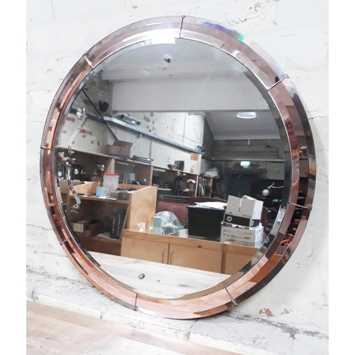 66 - A round Art Deco mirror, diameter 76cm