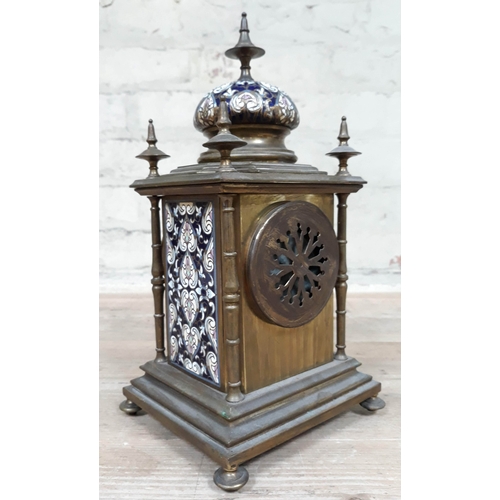 68 - A French late 19th Century champleve enamel and brass mantle clock, height 29cm.