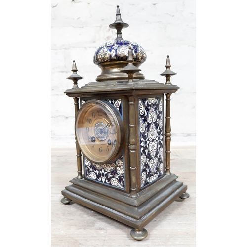 68 - A French late 19th Century champleve enamel and brass mantle clock, height 29cm.