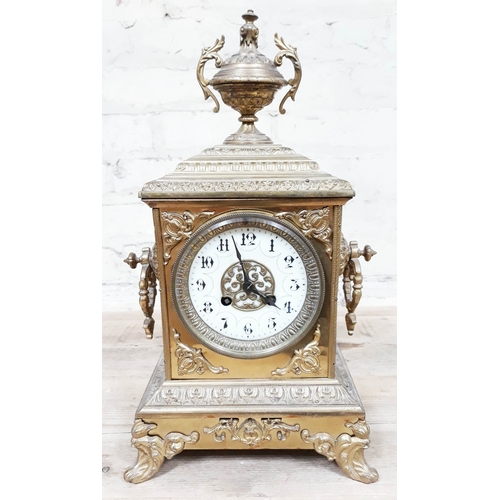 69 - A French late 19th Century gilt brass mantle clock with enamel dial, height 39cm.