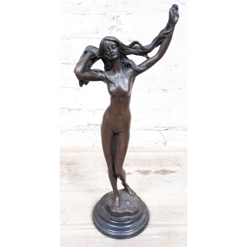 71 - A contemporary nude bronze signed Jean Patou on marble base, height 37cm.