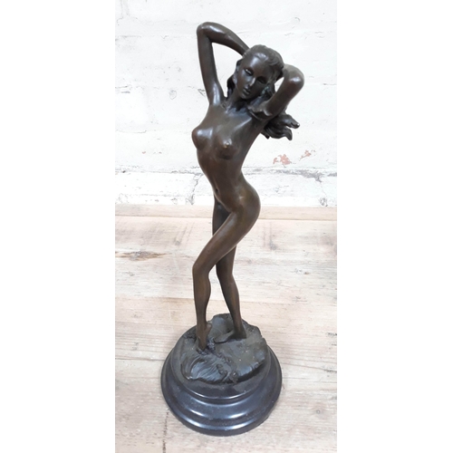 73 - A contemporary nude bronze signed Aldo Vitaleh on marble base, height 30cm.