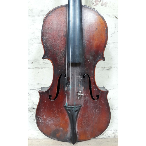 81 - A 19th Century German violin, length of back 37cm, cased with a single bow.