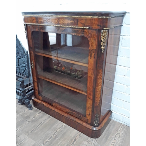 93 - A Victorian gilt brass mounted burr and figured walnut glazed dwarf bookcase of rectangular form wit... 