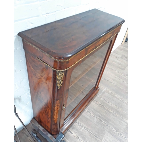 93 - A Victorian gilt brass mounted burr and figured walnut glazed dwarf bookcase of rectangular form wit... 