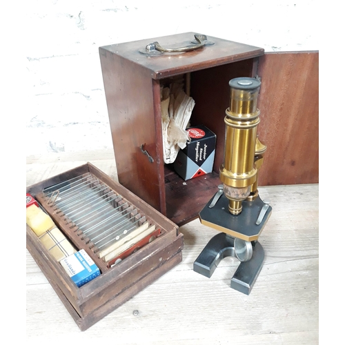 95 - A 19th Century Carl Zeiss Jena microscope no9858, with mahogany box and case of slides.