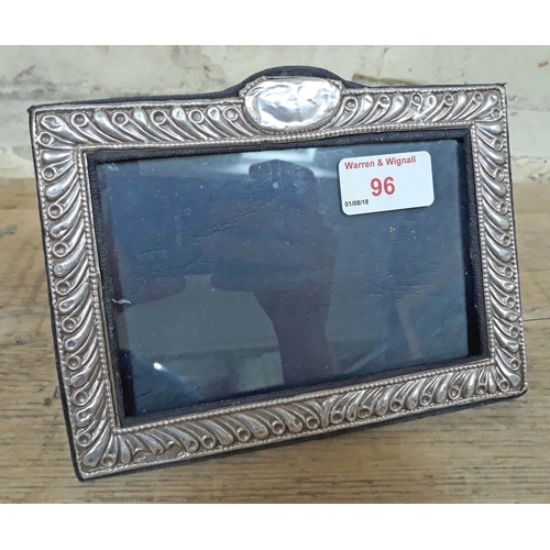 96 - A hallmarked silver photo frame, length 17.5cm.