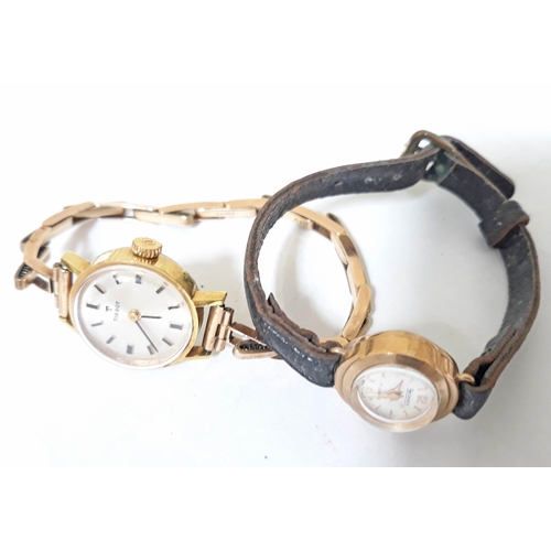 97 - A gold plated Tissot wristwatch with 9ct gold strap and a 9ct gold Regency wristwatch with leather s... 