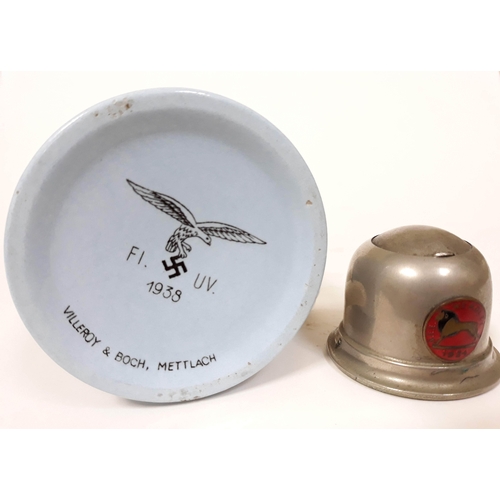 374 - A German WWII Nazi Luftwaffe mug by Villeroy & Boch, Mettlach, height 9.5cm, together with a silver ... 