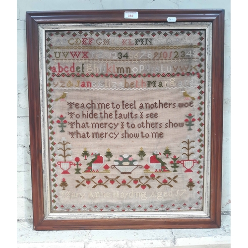 382 - A 19th Century sampler by Mary Anne Harding aged 17, label on verso, 65 x 57cm.