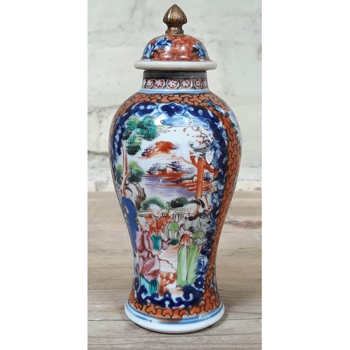 392 - A Chinese porcelain vase and cover, height 16cm.