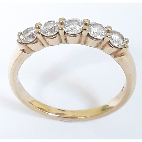 102 - A 5 stone diamond ring, the round cut stones total approx. wt. 0.75ct, band marked '14K', gross wt. ... 