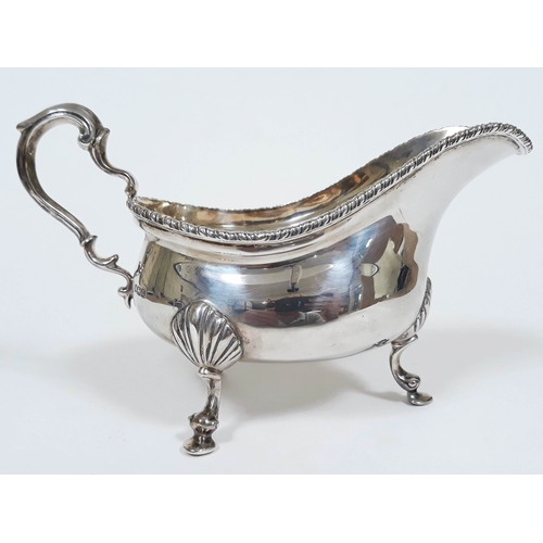 115 - A silver sauce boat, William & George Sissons, Sheffield 1929, length 20cm, wt. 12oz.