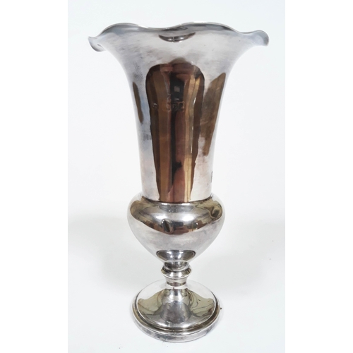 118 - A hallmarked silver vase, height 13cm.