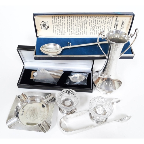 123 - A mixed lot of hallmarked silver comprising an ash tray, a vase, a pair of Scottish sugar tongs, 200... 