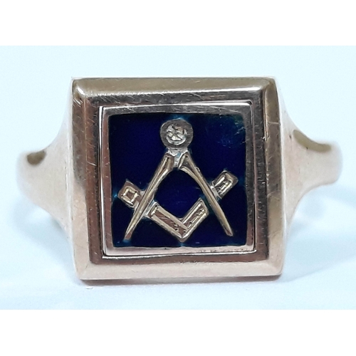 133 - A Masonic hallmarked 9ct gold ring with swivel enamel panel, gross wt. 4.3g, size P.