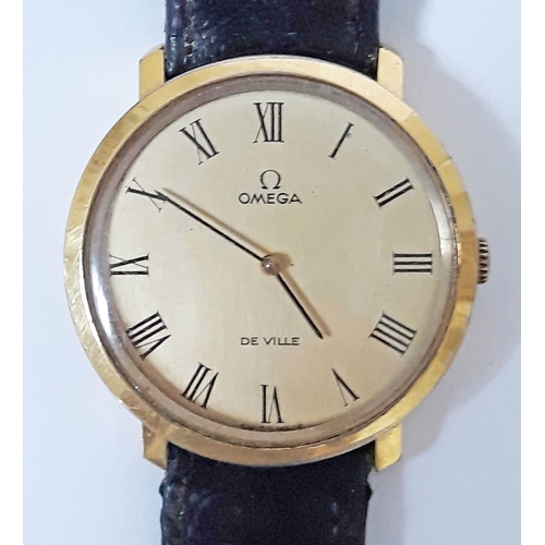 142 - A gold plated Omega DeVille wristwatch, diam. 32mm, with leather strap.