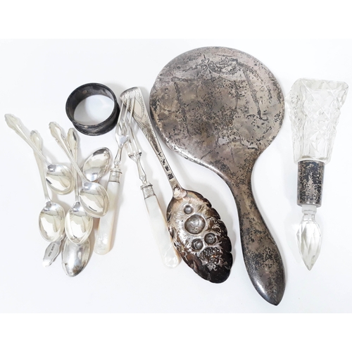 146 - A mixed lot of hallmarked silver comprising six tea spoons, a berry spoon, a silver backed mirror an... 