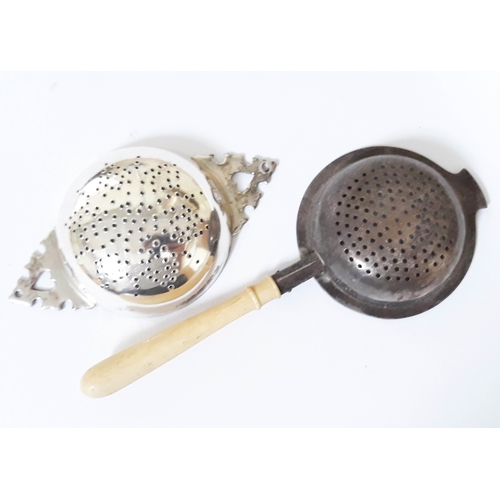 151 - Two hallmarked silver tea strainers, one having turned ivory handle.