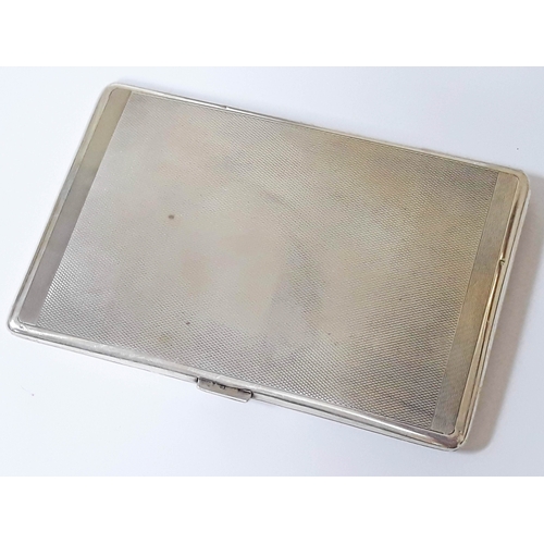 157 - A hallmarked silver cigarette case, length 13cm, wt. 5 1/12oz.