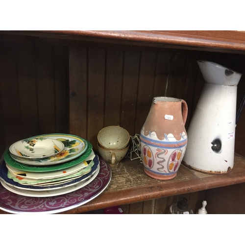 718 - Pottery plates and enamel jug