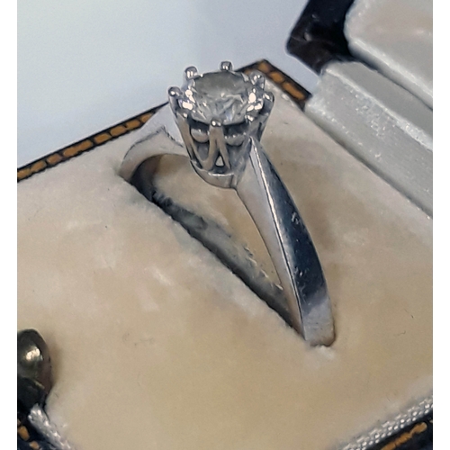 183 - A single stone diamond solitaire ring, the round brilliant cut diamond wt. 0.50 carats, hallmarked 1... 