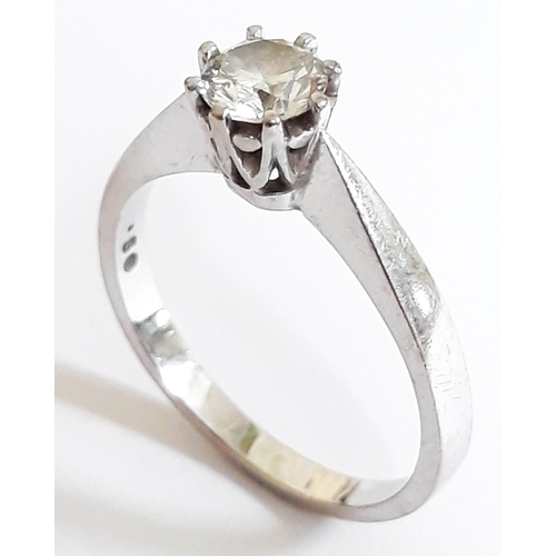 183 - A single stone diamond solitaire ring, the round brilliant cut diamond wt. 0.50 carats, hallmarked 1... 