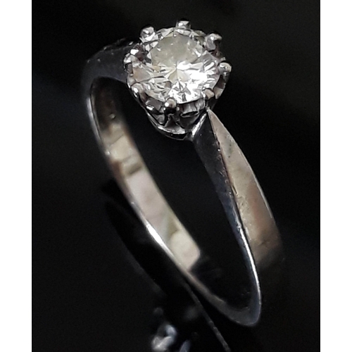 183 - A single stone diamond solitaire ring, the round brilliant cut diamond wt. 0.50 carats, hallmarked 1... 