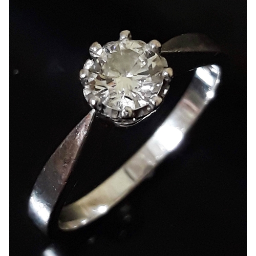 183 - A single stone diamond solitaire ring, the round brilliant cut diamond wt. 0.50 carats, hallmarked 1... 