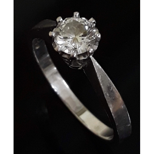 183 - A single stone diamond solitaire ring, the round brilliant cut diamond wt. 0.50 carats, hallmarked 1... 