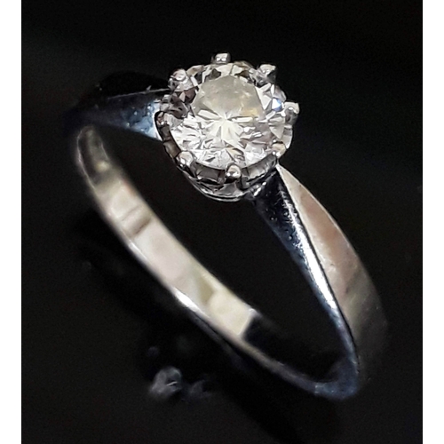 183 - A single stone diamond solitaire ring, the round brilliant cut diamond wt. 0.50 carats, hallmarked 1... 