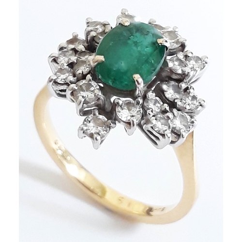 184 - An emerald and diamond cluster ring, the central stone measuring 7mm x 5mm x 3mm, 18ct gold import m... 