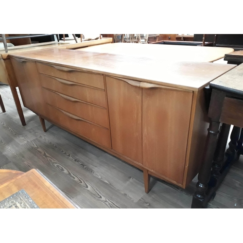 70 - A 1960s teak sideboard, length 183cm.