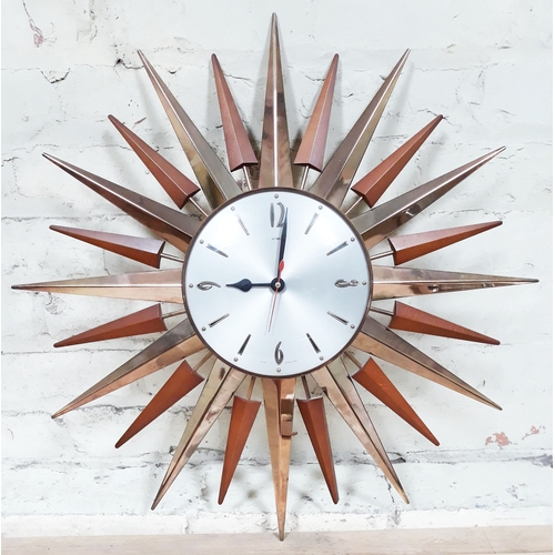 73 - A retro Metamec sunburst clock, diam. 59cm.