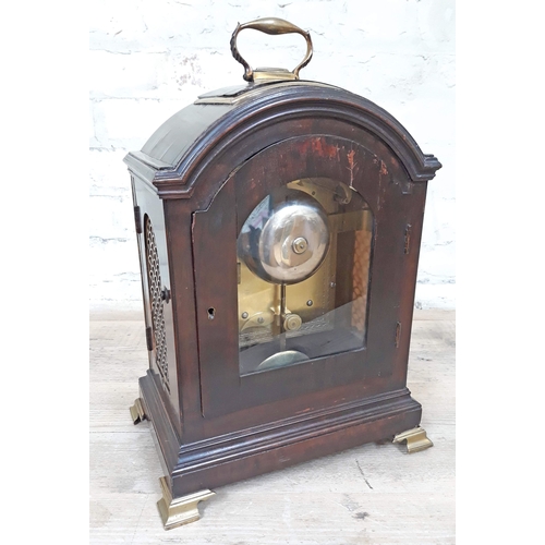 74 - A Regency bracket clock having dome top with gilt brass handle, gilt brass grille sides, painted dia... 