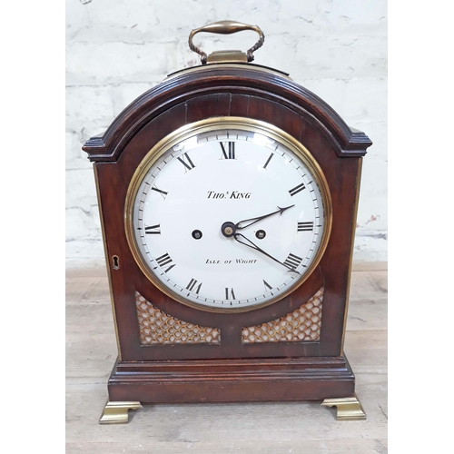 74 - A Regency bracket clock having dome top with gilt brass handle, gilt brass grille sides, painted dia... 