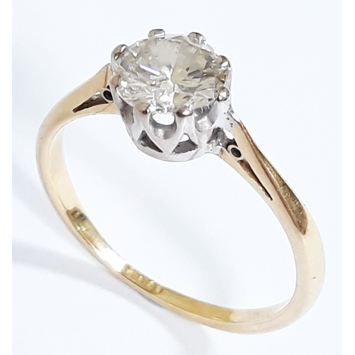 92 - A single stone diamond solitaire ring, the diamond approx. 0.70 carats, the band marked '18ct', gros... 