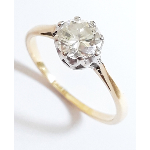 92 - A single stone diamond solitaire ring, the diamond approx. 0.70 carats, the band marked '18ct', gros... 